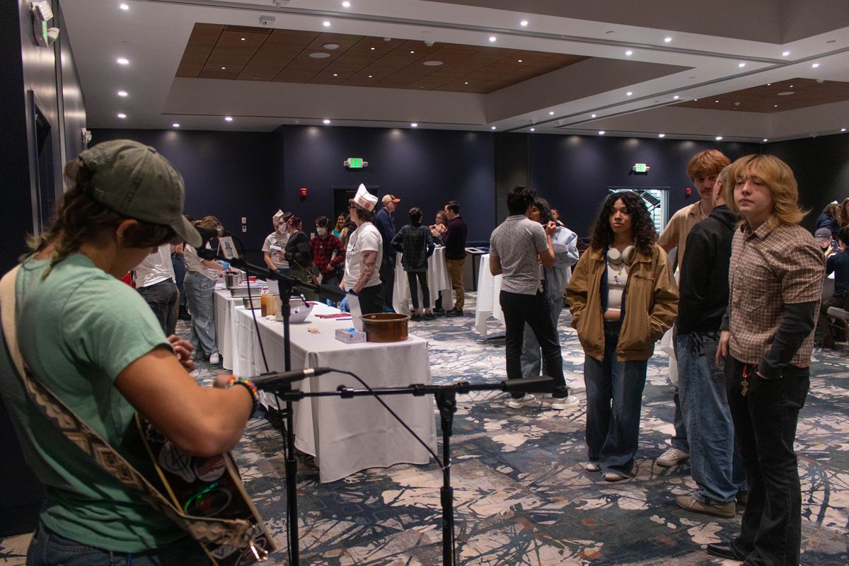 The Sundae Showdown event floor, attendees browsing tasting stations